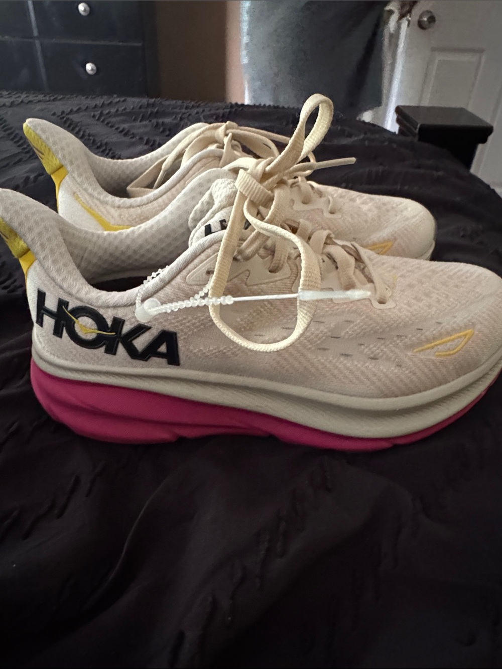 Hoka Women's Cream Running Shoes with Pink Midsole and Yellow Accents